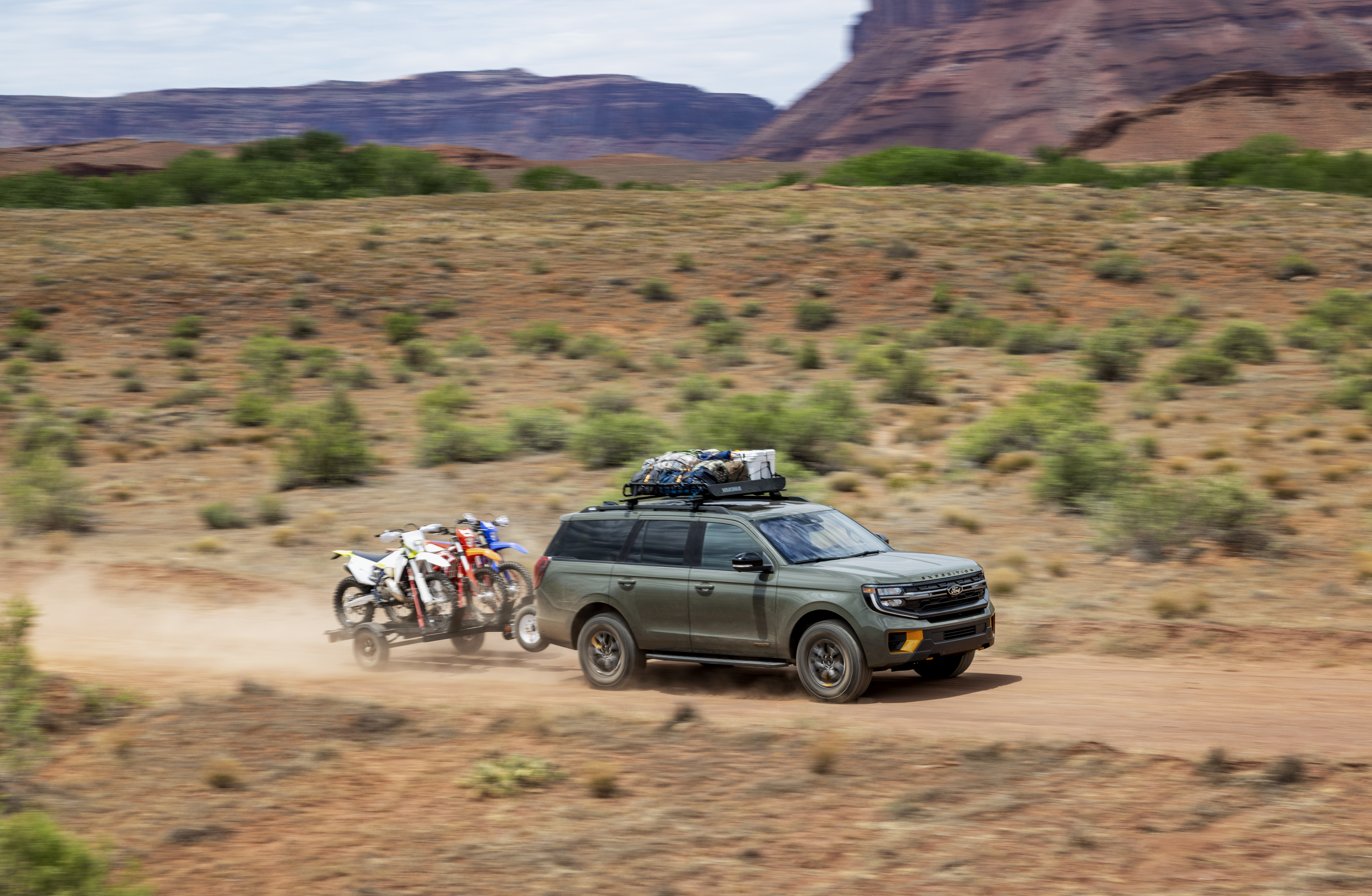 Always properly secure cargo. Available Ford and aftermarket accessories shown.